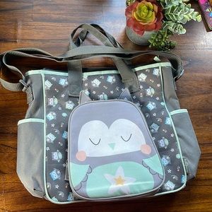 Owl diaper bag with adjustable strap and 2 side bottle holders.